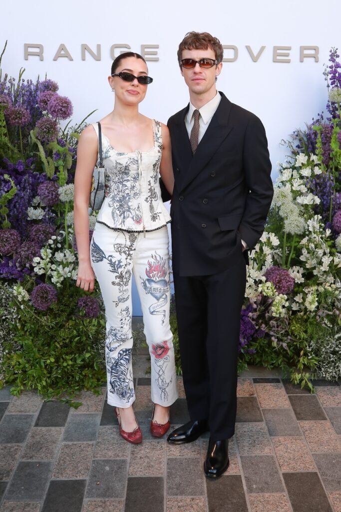 Hannah Walters wearing archival Roberto Cavalli Spring 2003 at the Wimbledon 2026 men's final. Joseph Quinn wearing Paul Smith at the Wimbledon 2026 men's final.