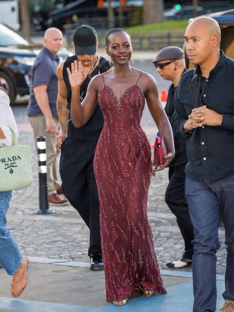 lupita nyong'o red dress Coral-Red Chanel, Sculptural Natural Hair & Burgundy Lips: Lupita Nyong'o at The Odyssey Paris Premiere
