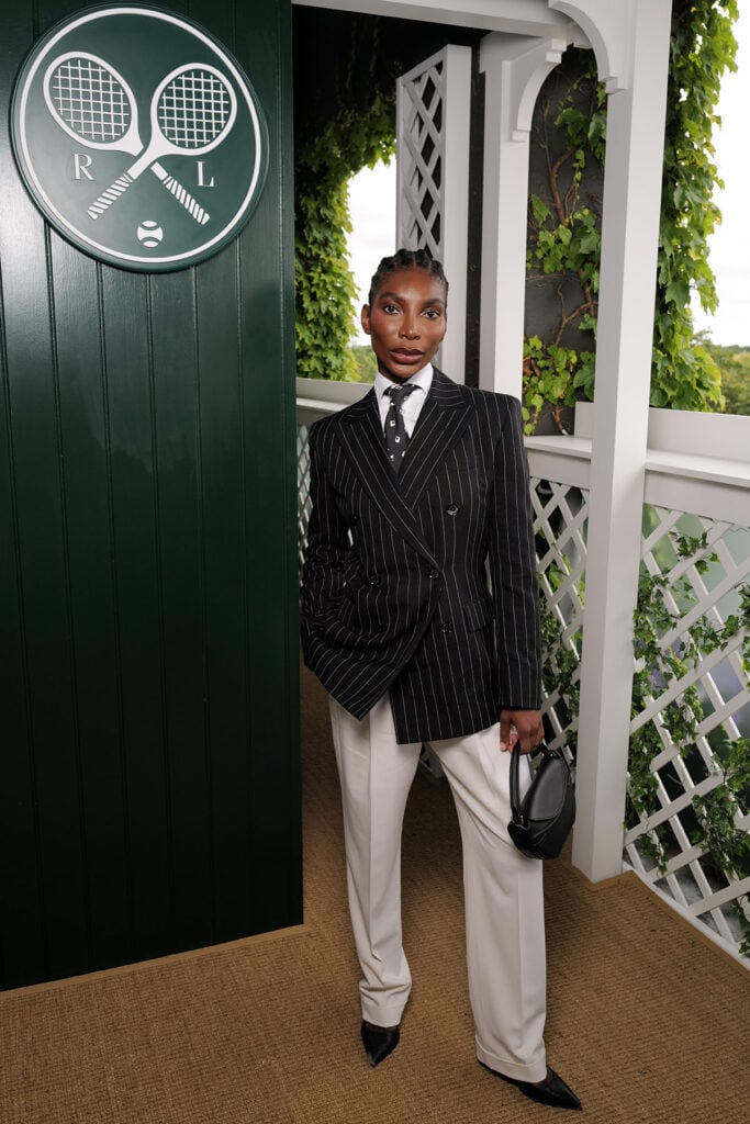 Michaela Coel, wearing Ralph Lauren, attends the Ralph Lauren suite during The Championships, Wimbledon 