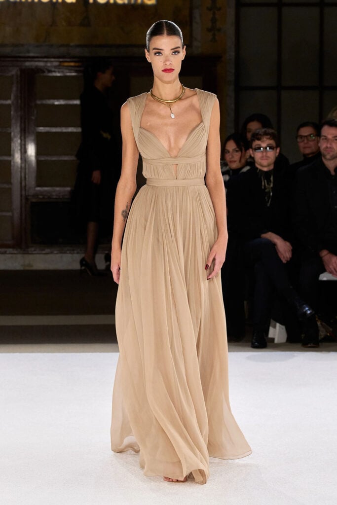 Pamella Roland Fall 2026 antique gold pleated chiffon gown on the runway.