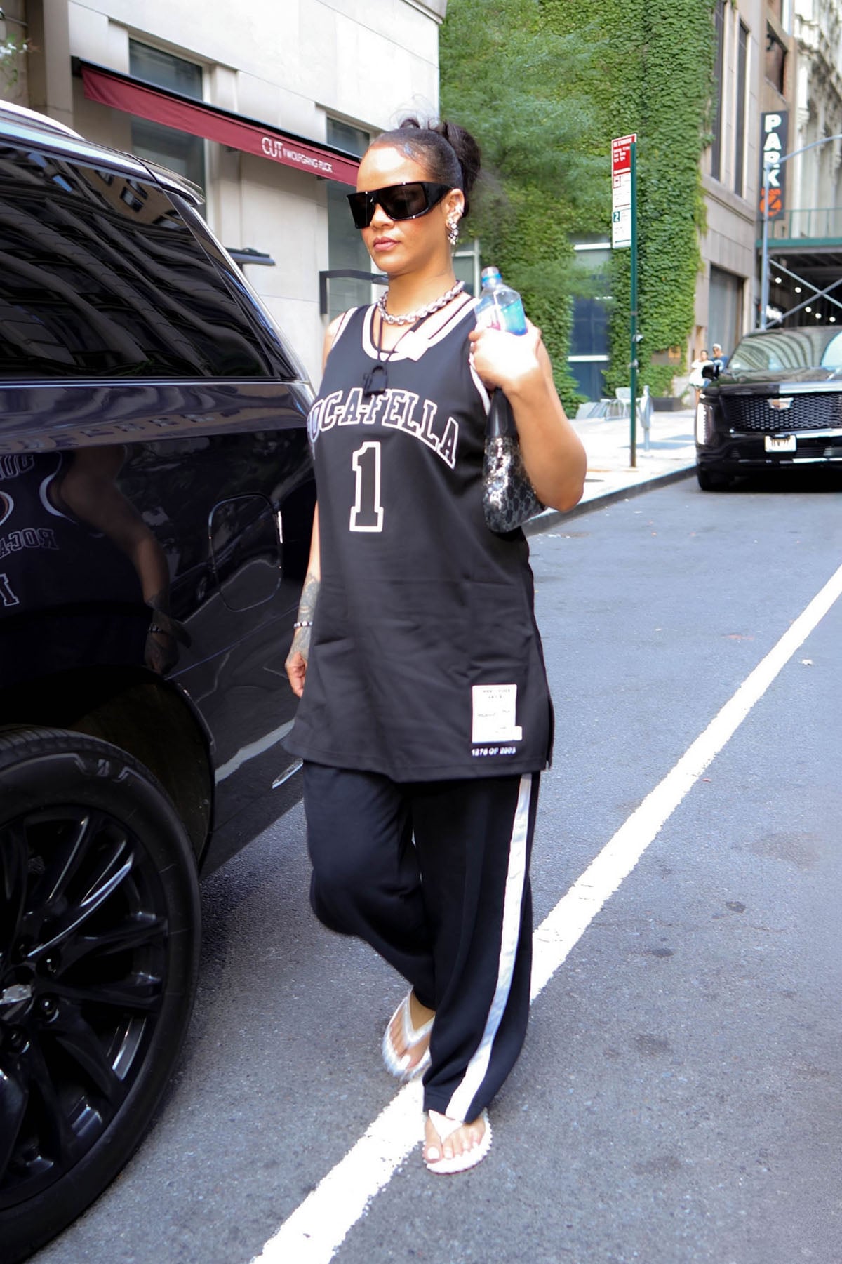 Rihanna Fuels Music Comeback Talk In Roc-A-Fella Jersey