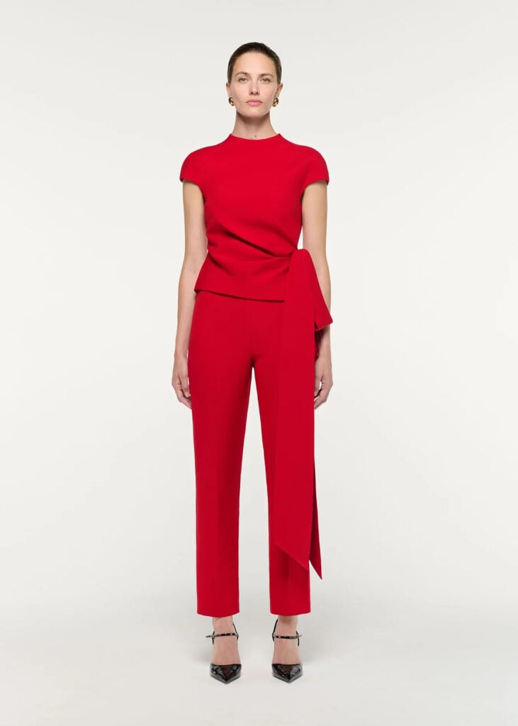 Roland Mouret red asymmetric top and tailored trousers from the designer's collection look book.