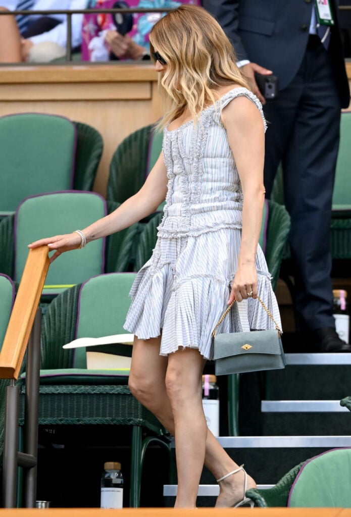 Sienna Miller wearing McQueen Spring 2026 at the Wimbledon 2026 men's final.