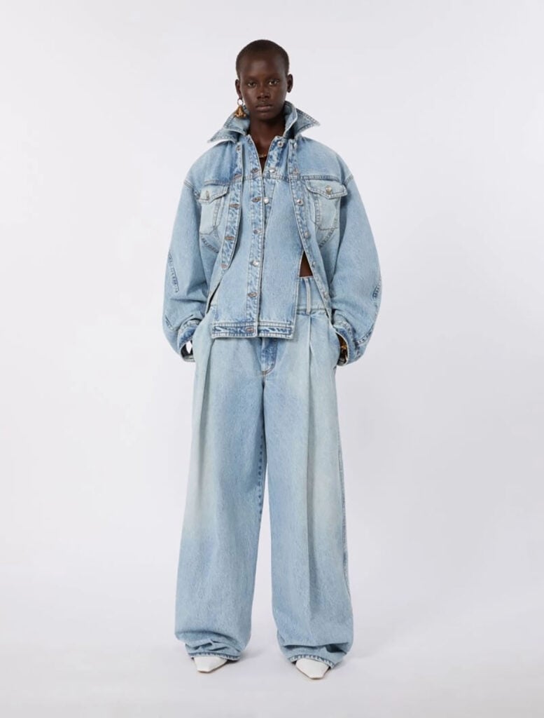 Sportmax Spring 2026 runway look featuring the oversized denim silhouette worn by Jessica Biel at Comic-Con.