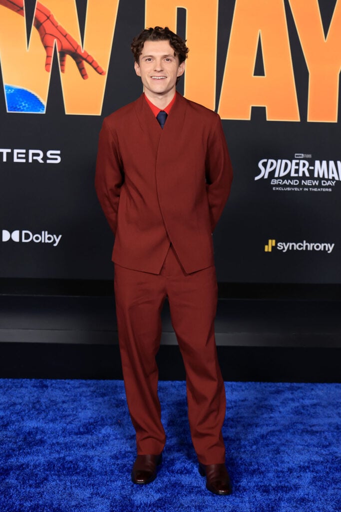 Tom Holland wears a custom Jacquemus suit inspired by the "Le Palmier" collection at the Spider-Man: Brand New Day premiere.