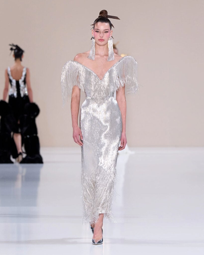 Tamara Ralph Spring 2026 Couture silver crystal fringe gown on the runway.
