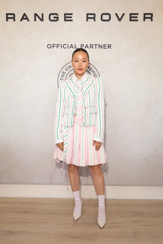 Yerin Ha wearing Thom Browne Spring 2026 at Day 13 of Wimbledon 2026 in London.