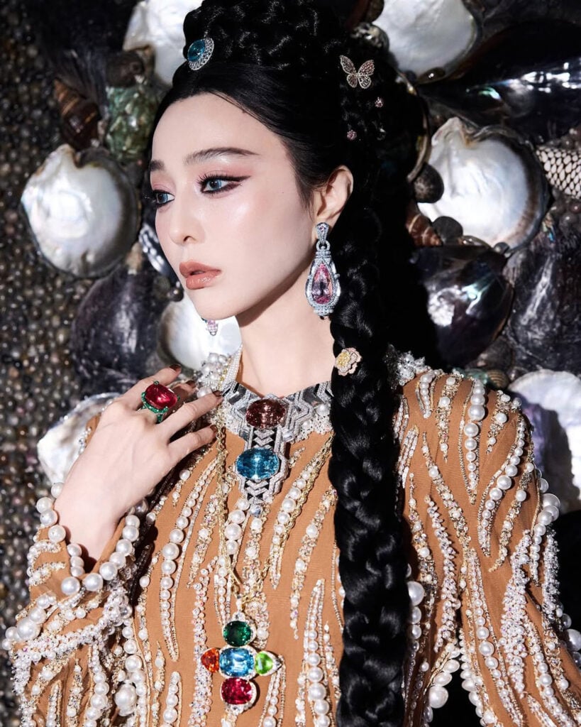 Close-up of Fan Bingbing in Manish Malhotra Couture with braided hairstyle and statement gemstone jewellery.