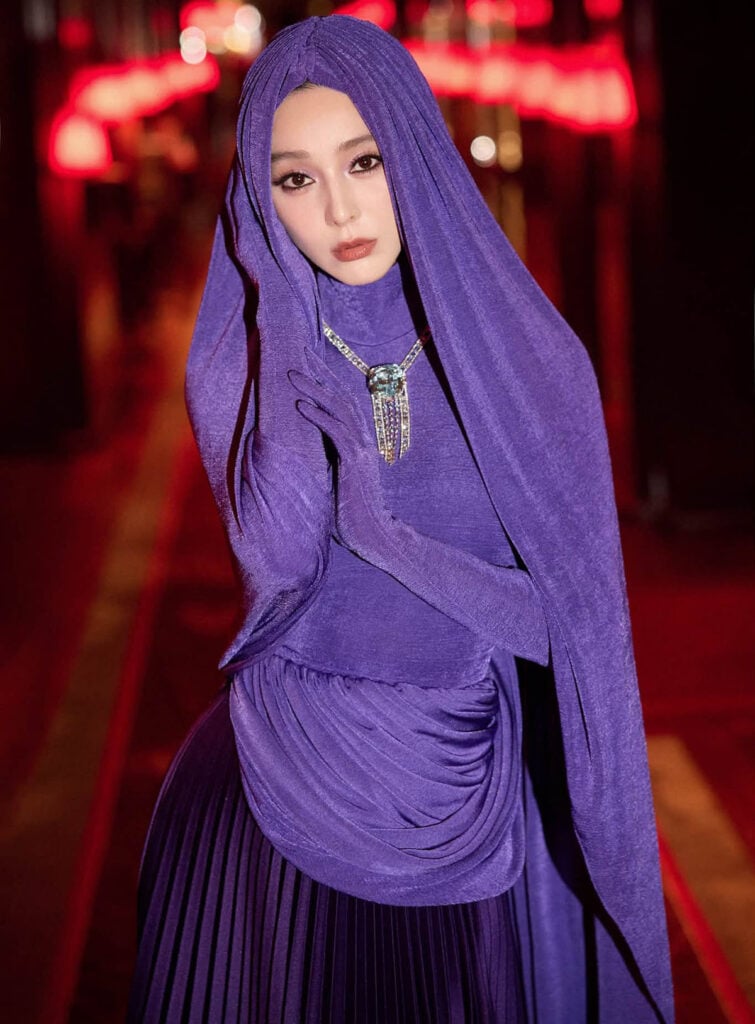 Close-up of Fan Bingbing in Robert Wun Fall 2026 Haute Couture with monochromatic purple styling.