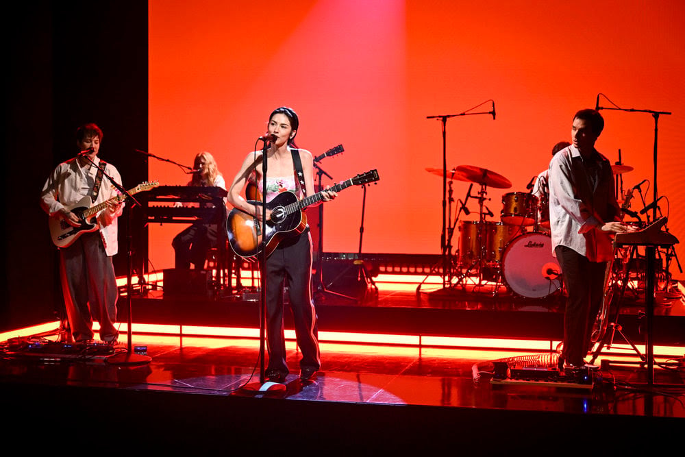 Gracie Abrams performs "Minibar" on The Tonight Show Starring Jimmy Fallon wearing a Chloé Garden Print bodysuit and track pants.