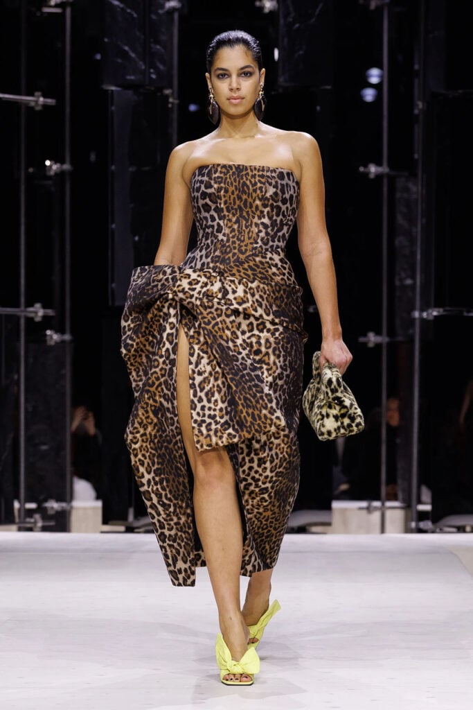 Givenchy Fall 2026 strapless leopard-print dress with an asymmetric draped skirt on the runway