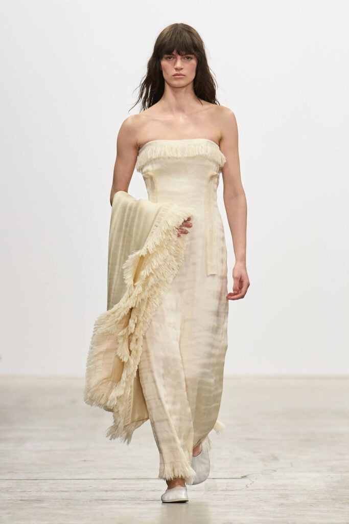 Fforme ivory silk-cotton organza fringed dress presented on the Fall 2026 runway.