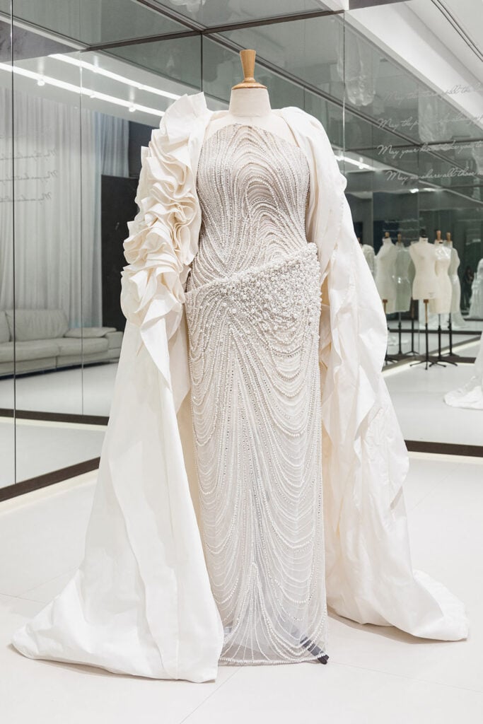 Custom Tony Ward Couture gown displayed on a mannequin following its post-Cannes reveal.