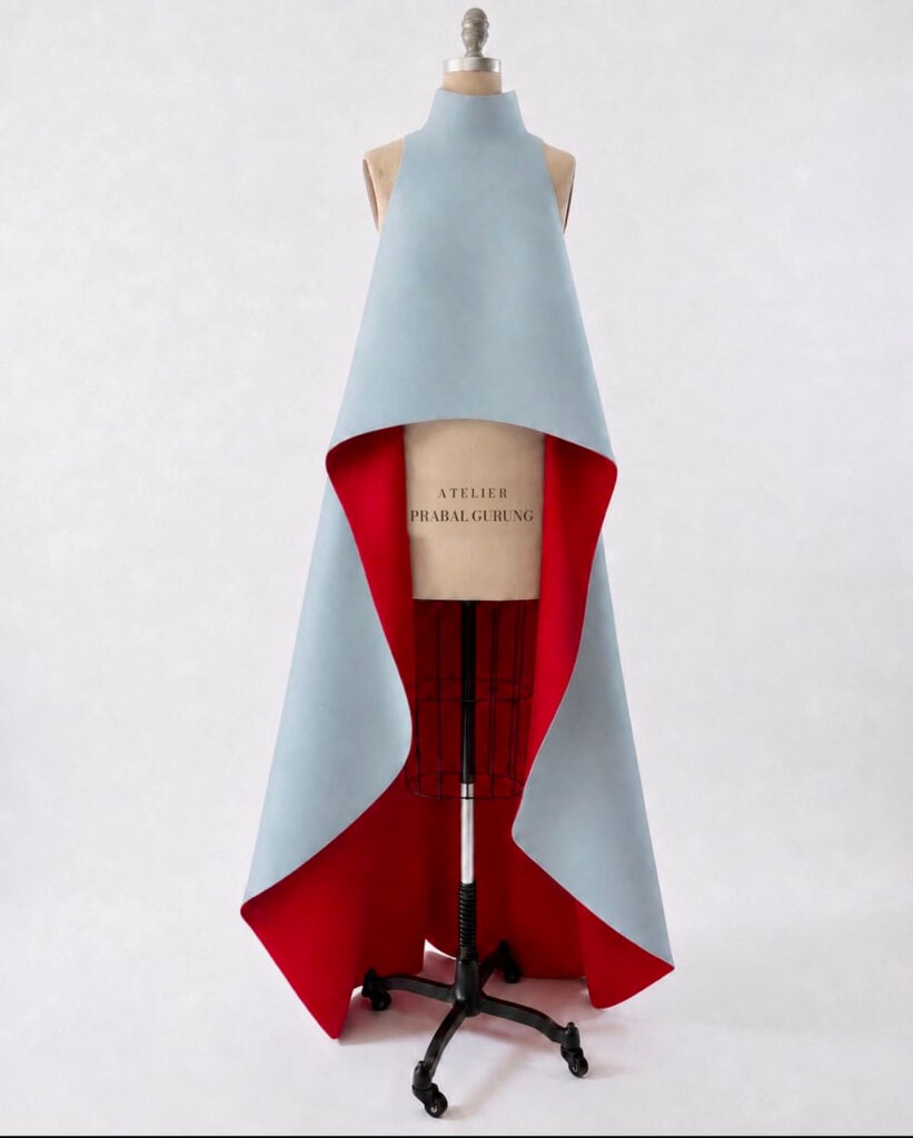 Anne Hathaway’s custom Atelier Prabal Gurung halter top displayed with its celestial-blue exterior and crimson silk lining.