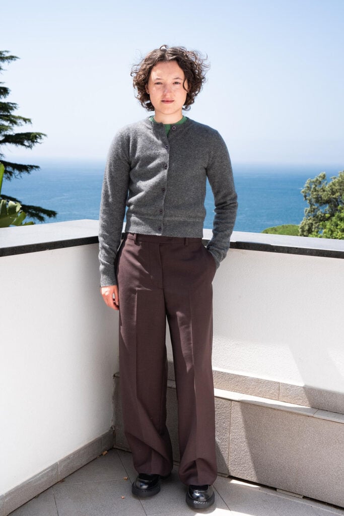 Bella Ramsey wearing Miu Miu at the 'Sunny Dancer' photocall during the Giffoni Film Festival in Italy.
