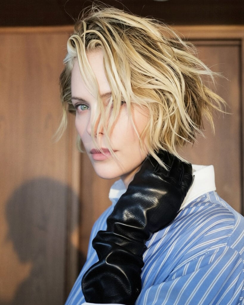 Charlize Theron leather gloves 'The Odyssey' Seoul Press Conference