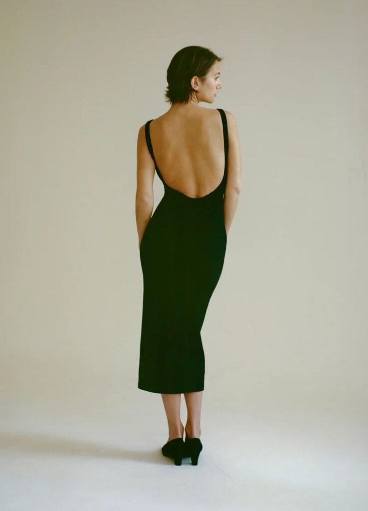 Back view of the Yana Matkivski Donna dress featuring a low scoop back worn by Kaia Gerber