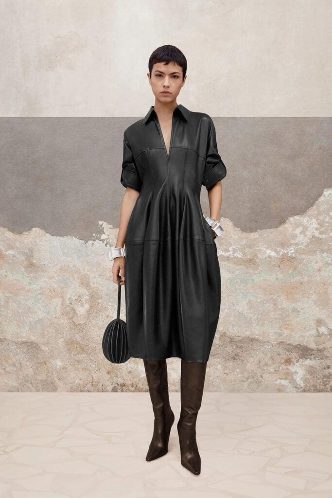Bottega Veneta Pre-Fall 2023 black leather shirt dress with a balloon skirt and rolled sleeves