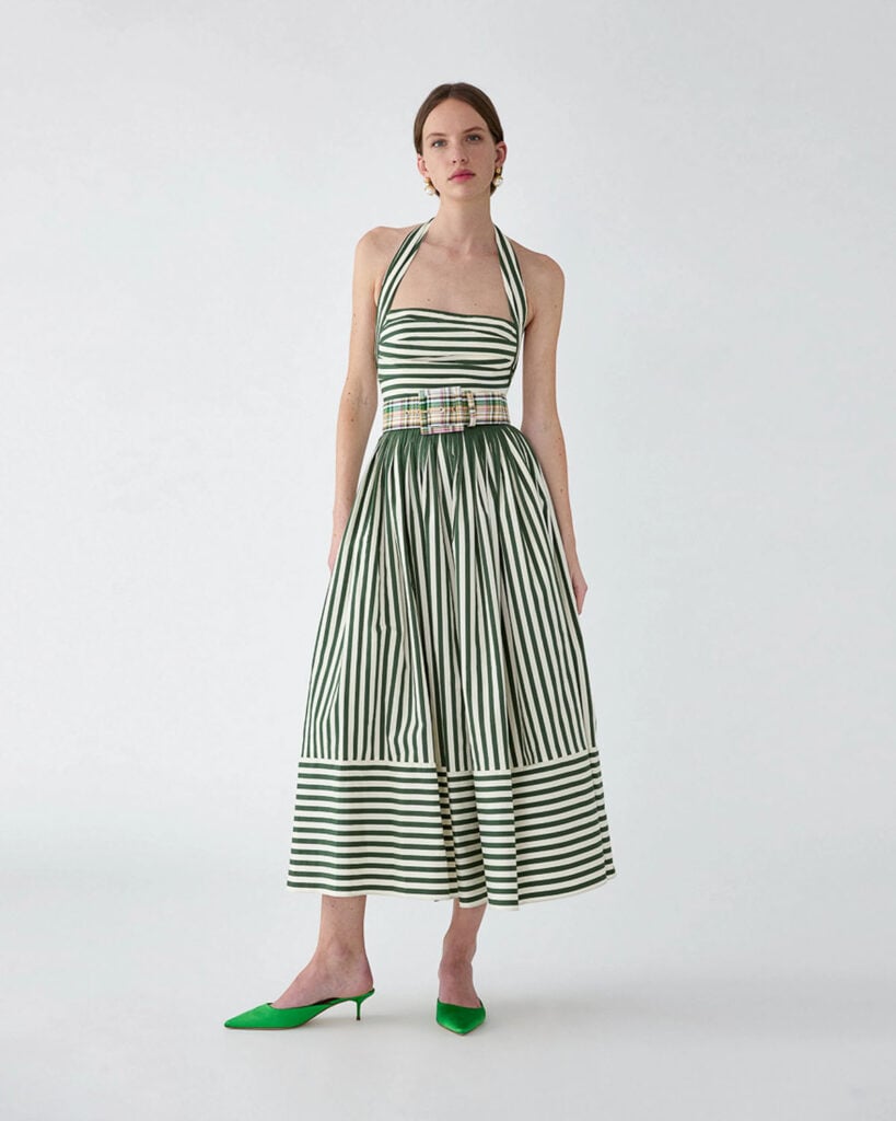 Carolina Herrera Pre-Fall 2026 ivory and racing-green striped halterneck midi dress with contrasting belt