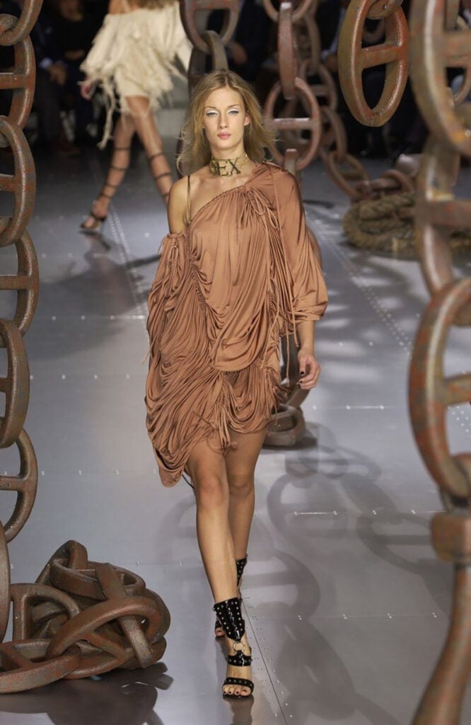 Dolce & Gabbana Spring 2003 ‘Love and Sex’ draped mini dress with the original ‘SEX’ choker on the runway.