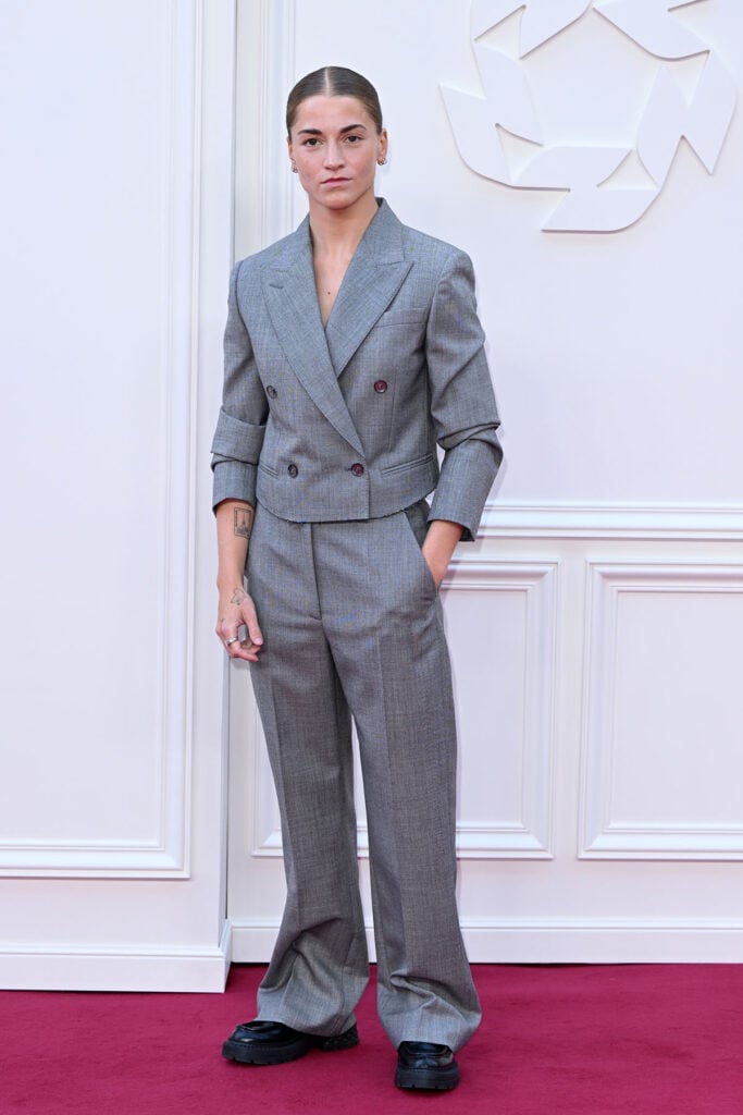 Jessica Park wears a grey cropped McQueen suit at the 2026 PFA Awards in Manchester.