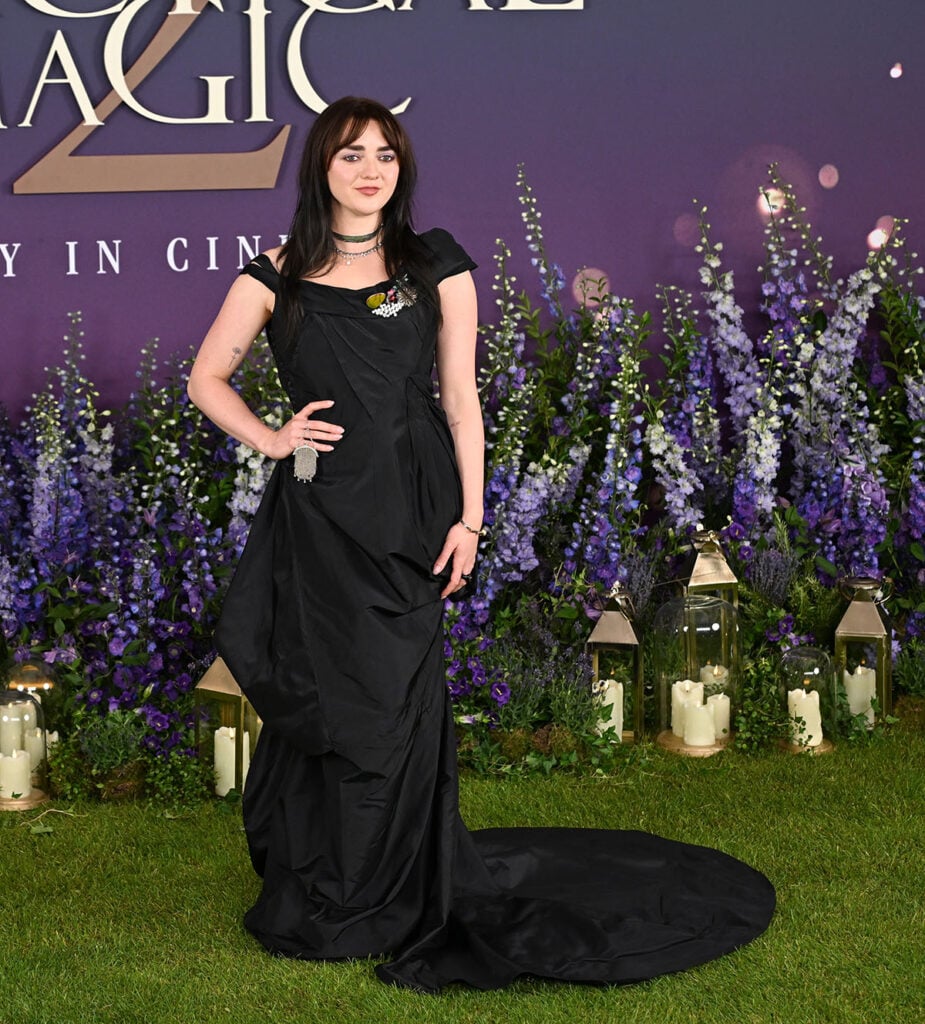 Maisie Williams in Sandra Bullock’s vintage black dress at the Practical Magic 2 London photocall