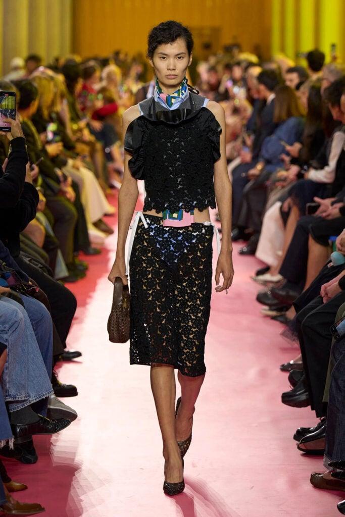 Black lace top and knee-length skirt on the Miu Miu Spring 2026 runway