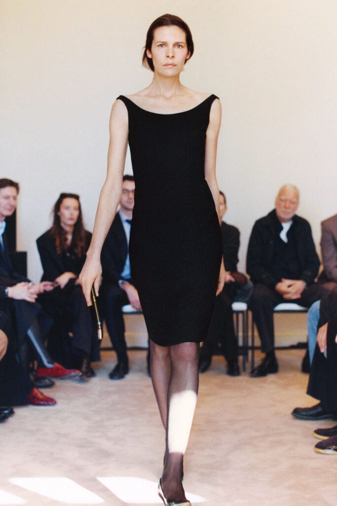 Black knee-length dress from The Row Resort 2027 collection
