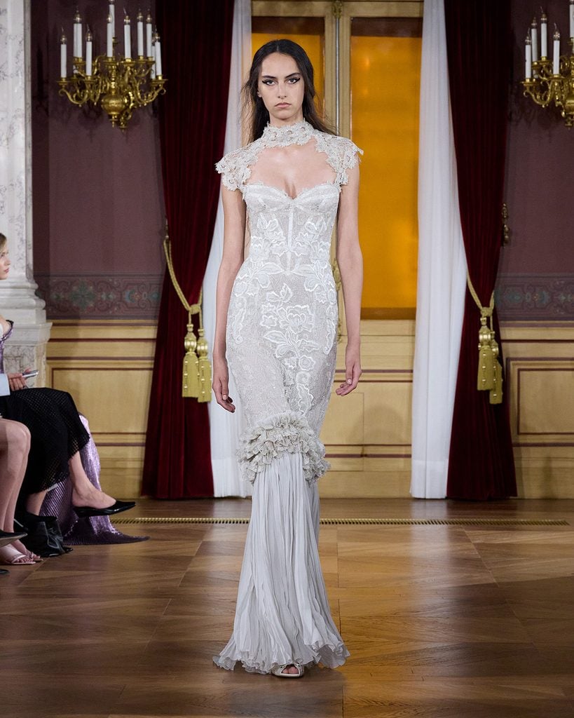 Naomi Campbell in a corseted white ArdAzAei Couture gown celebrating the Royal Oak ‘Serena Williams’ Limited Edition.