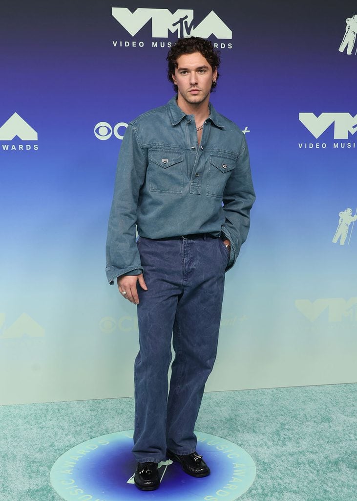 Belmont Cameli wearing a Ferragamo double-denim jacket and jeans with a white shirt at the 2026 MTV VMAs.