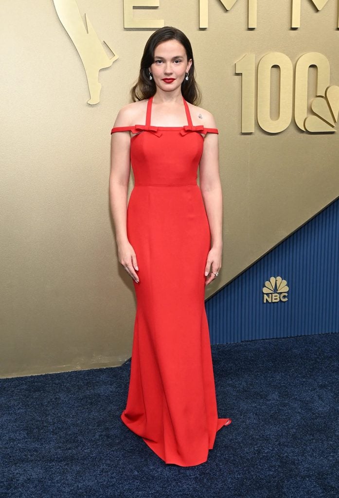 Cailee Spaeny wearing a red Miu Miu column gown with bow detailing at the 2026 Emmy Awards.