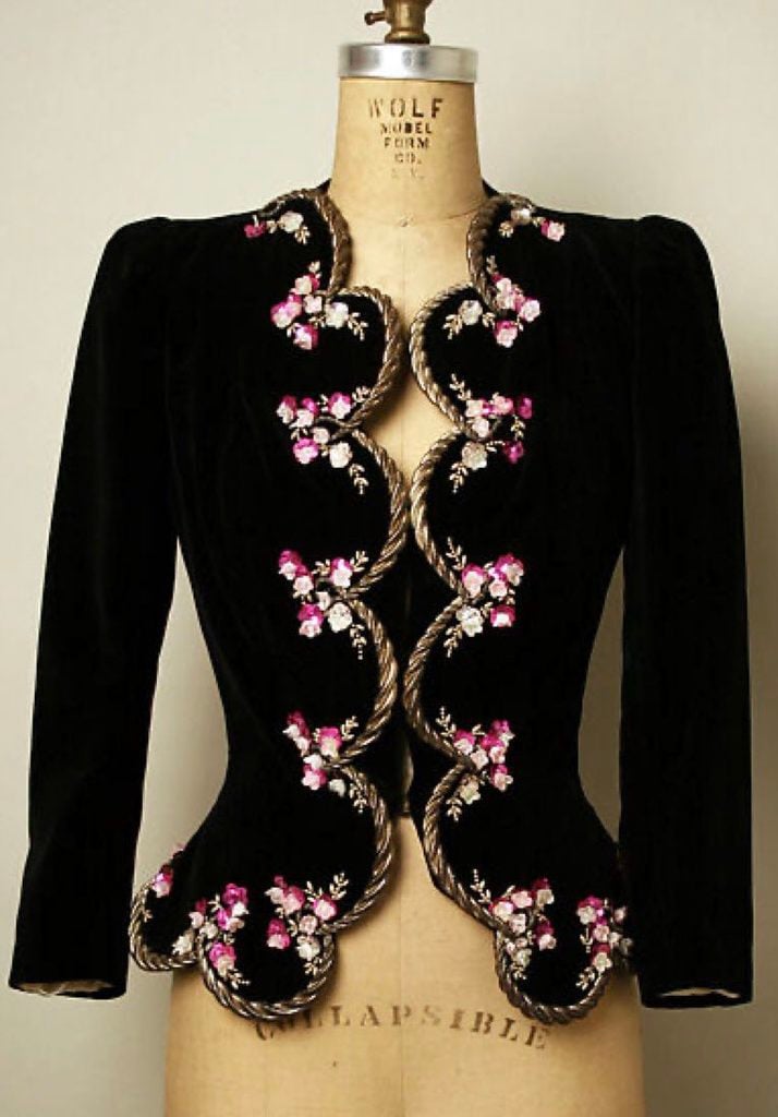 Elsa Schiaparelli’s 1937 embroidered black couture jacket, referenced in Céline Dion’s custom Schiaparelli stage look.