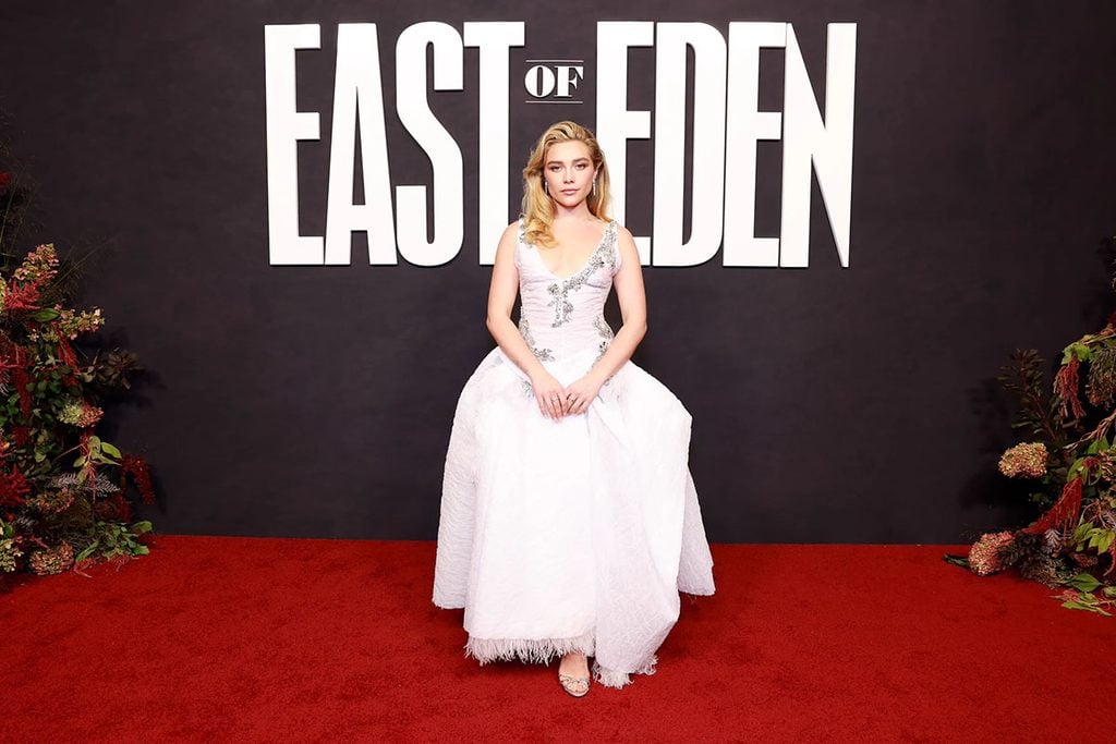 Florence Pugh wearing a white Erdem Resort 2027 dress at the ‘East of Eden’ Netflix event in New York with silver sandals