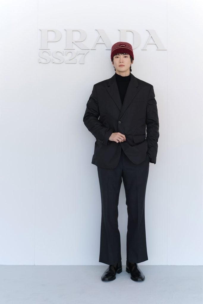 Jaehyun wearing Prada tailoring at the Spring/Summer 2027 womenswear show in Milan.