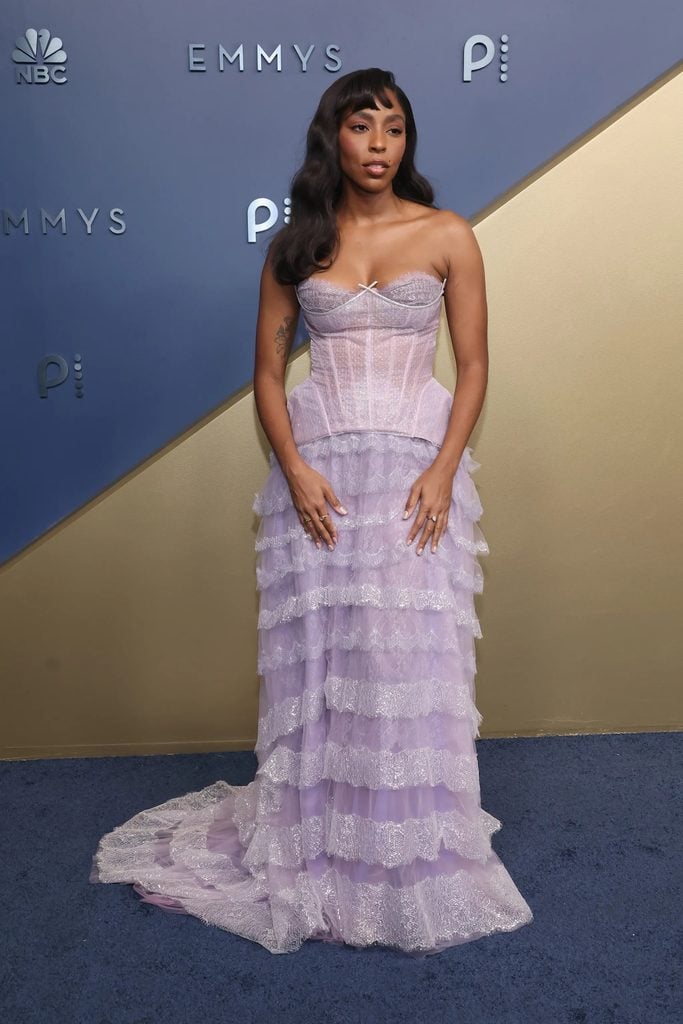 Jessica Williams wearing a lilac custom Honor gown with a corseted bodice and tiered skirt at the 2026 Emmy Awards.