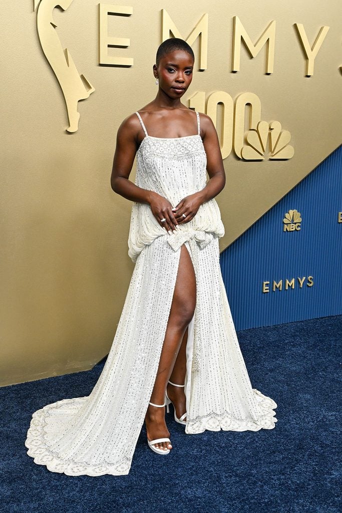Joy Sunday wearing a white embroidered Dior bustier dress at the 2026 Emmy Awards.