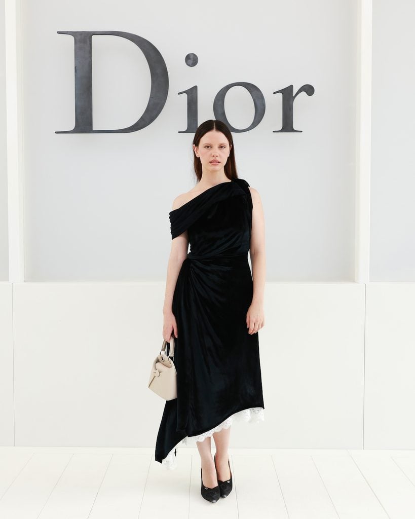 Mia Goth wearing black Dior at the Dior Spring 2027 show in Paris.