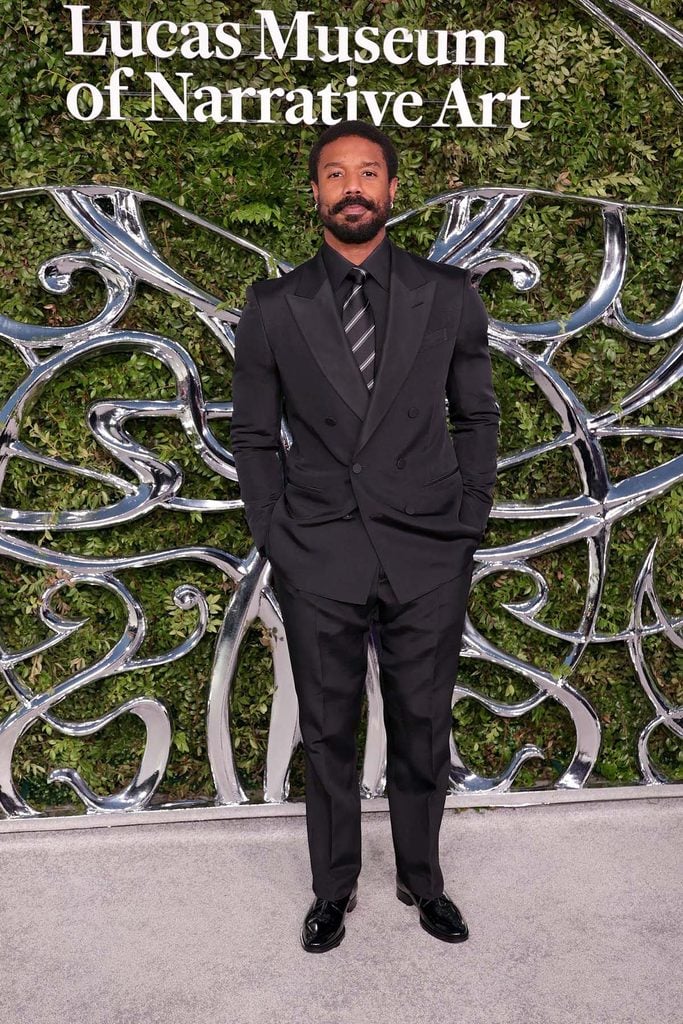 Michael B. Jordan wearing a black Tom Ford double-breasted suit at the Lucas Museum Opening Night in Los Angeles.