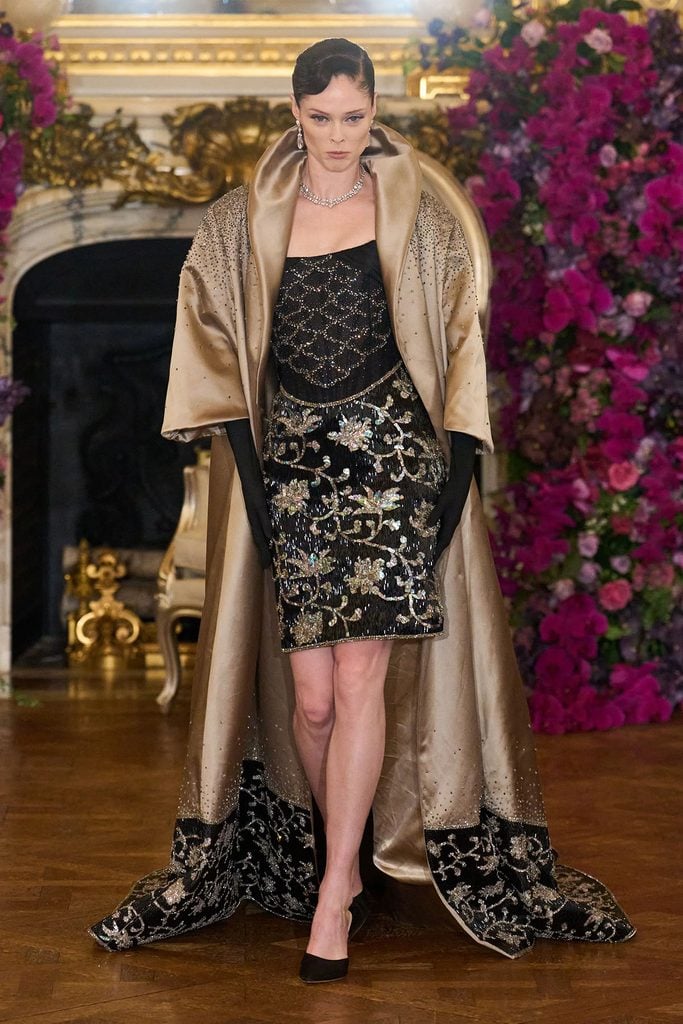 Miss Sohee Spring 2026 Couture runway look featuring the embellished mini dress with a sweeping cape.