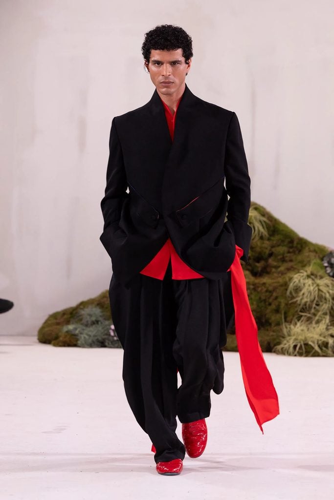 Orange Culture Fall 2026 runway look worn by Hudson Williams at the YAGA premiere during TIFF