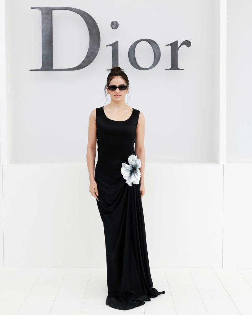 RosalÃa wearing Dior at the Dior Spring 2027 show in Paris.