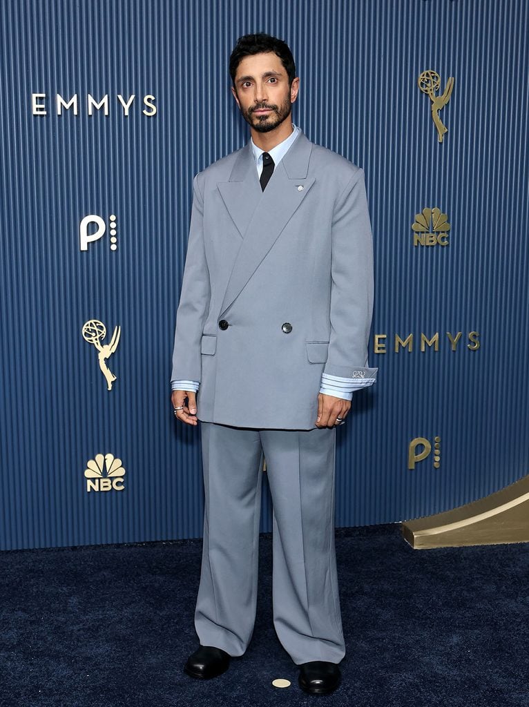 Riz Ahmed, Julia Garner and Jack Lowden wearing Loewe at the 2026 Emmy Awards.