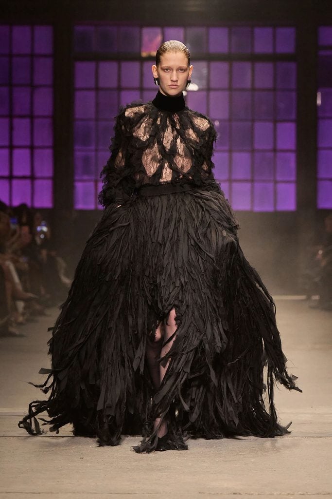 Roberto Cavalli Fall 2026 black Chantilly lace blouse and distressed-chiffon crinoline skirt shown on the runway