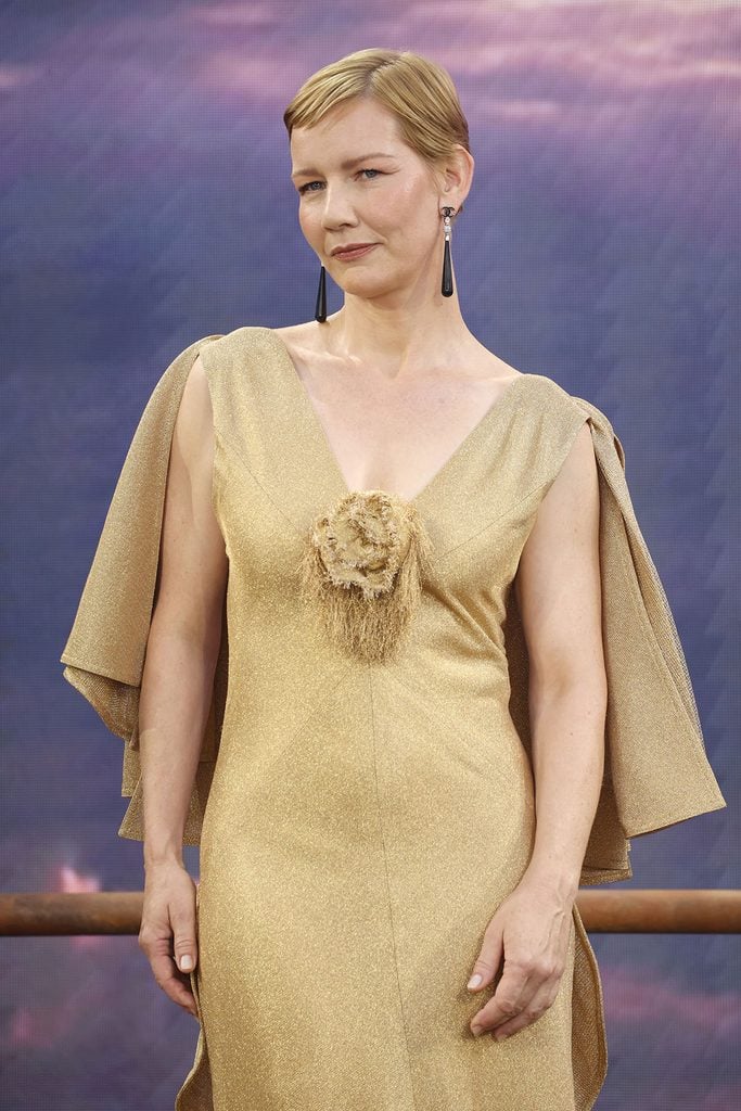 Sandra Huller attends the "Digger" Film And TV Charity Royal Film Performance in gold Chanel dress