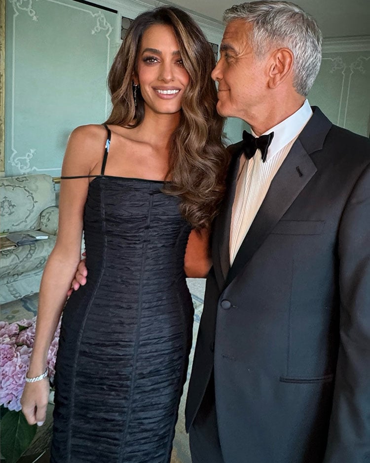 Amal Clooney with George Clooney ahead of the Venice Film Festival red carpet, wearing custom Tom Ford by Haider Ackermann.