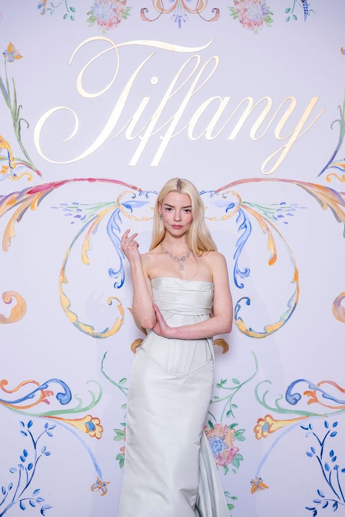 Anya Taylor-Joy showcases her Tiffany & Co. diamond necklace with her strapless Zuhair Murad gown at the Blue Book gala in Venice.