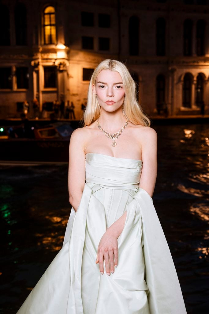 Anya Taylor-Joy wears Tiffany & Co. diamond jewellery with her strapless Zuhair Murad Couture look beside the Grand Canal in Venice.