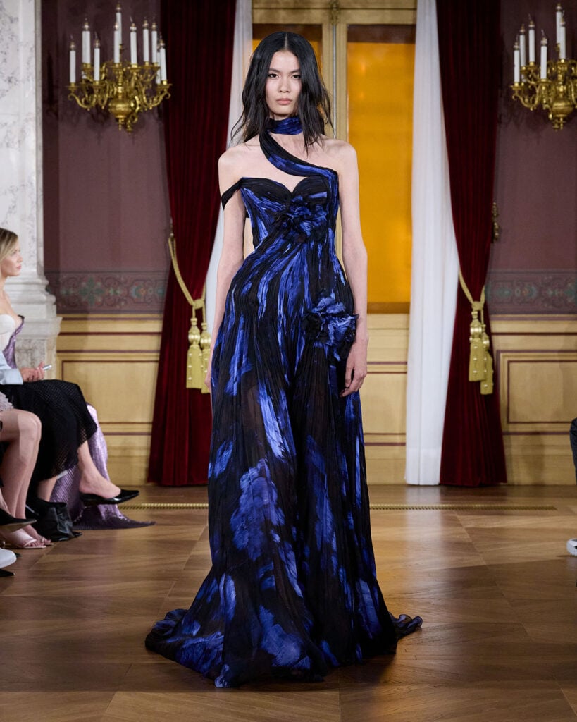 ArdAzAei Fall 2026 Couture Look 21 from The Nightingale’s Rose collection featuring a black-and-electric-blue floral chiffon gown.
