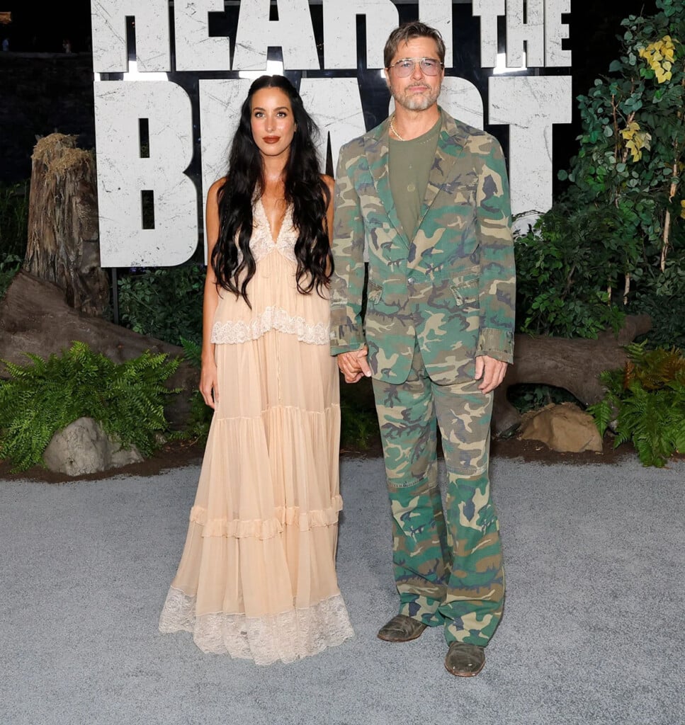 Brad Pitt in a camouflage Greg Lauren suit alongside Ines de Ramon in Chloé at the Heart of the Beast premiere
