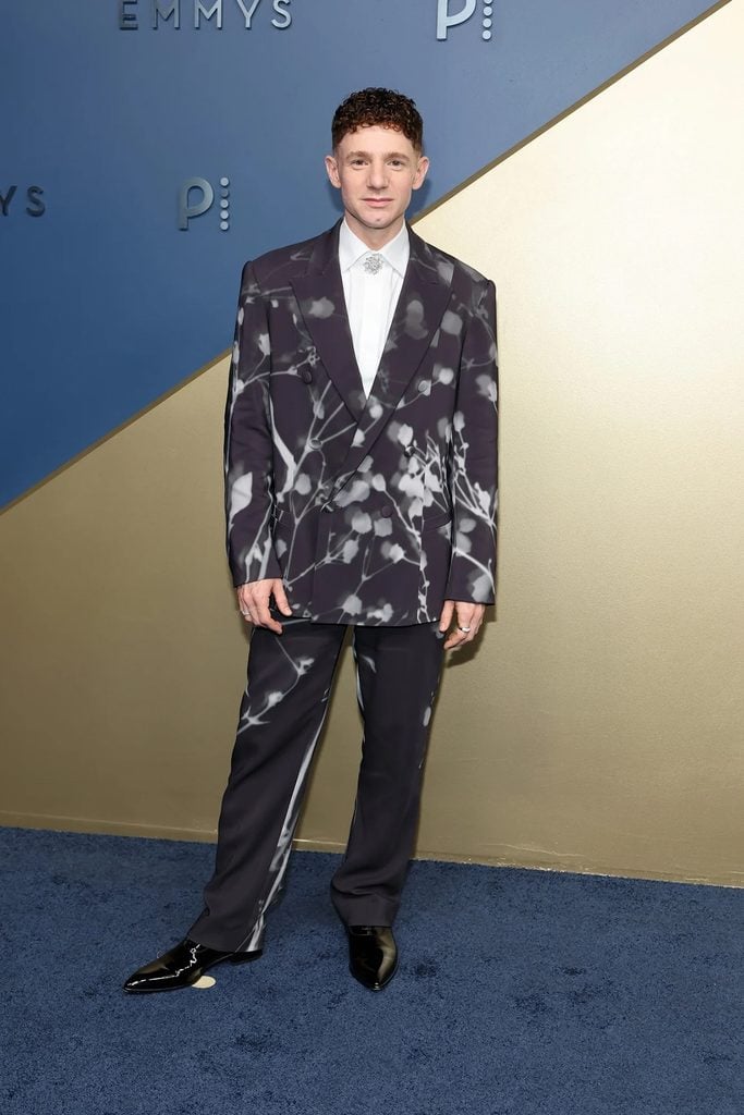 Chris Perfetti wearing a floral Wiederhoeft suit at the 2026 Emmys.